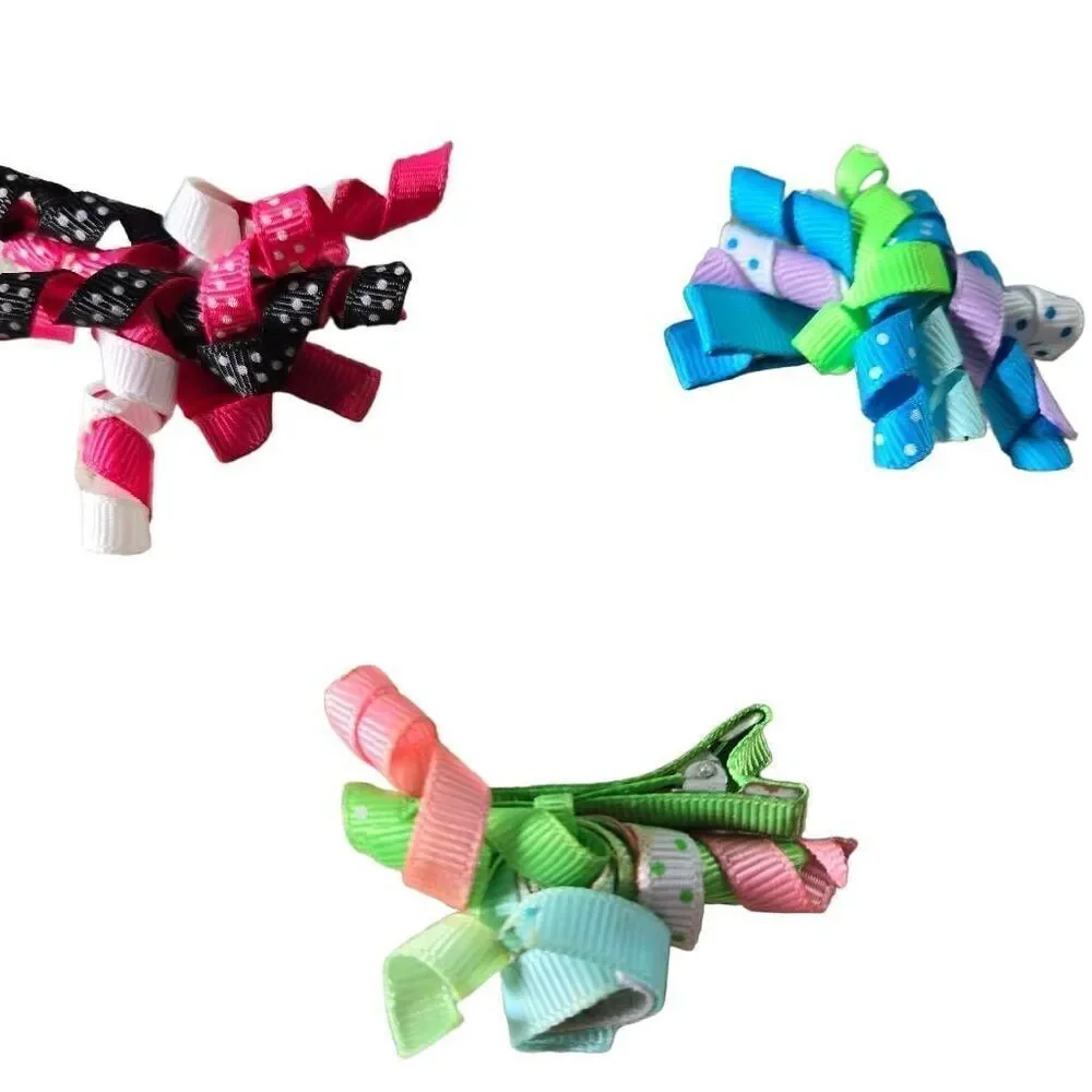 5 infant twirly bows, 2